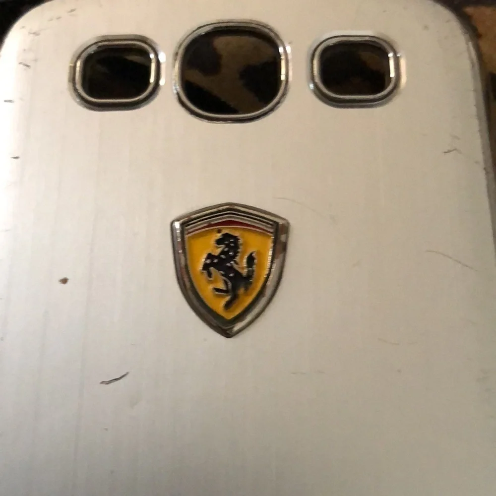 FERRARI silver cell phone case I believe it’s fit a iPhone 5s- 6- 7 ,8